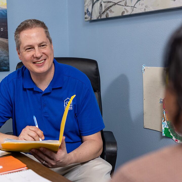 Employee helping person